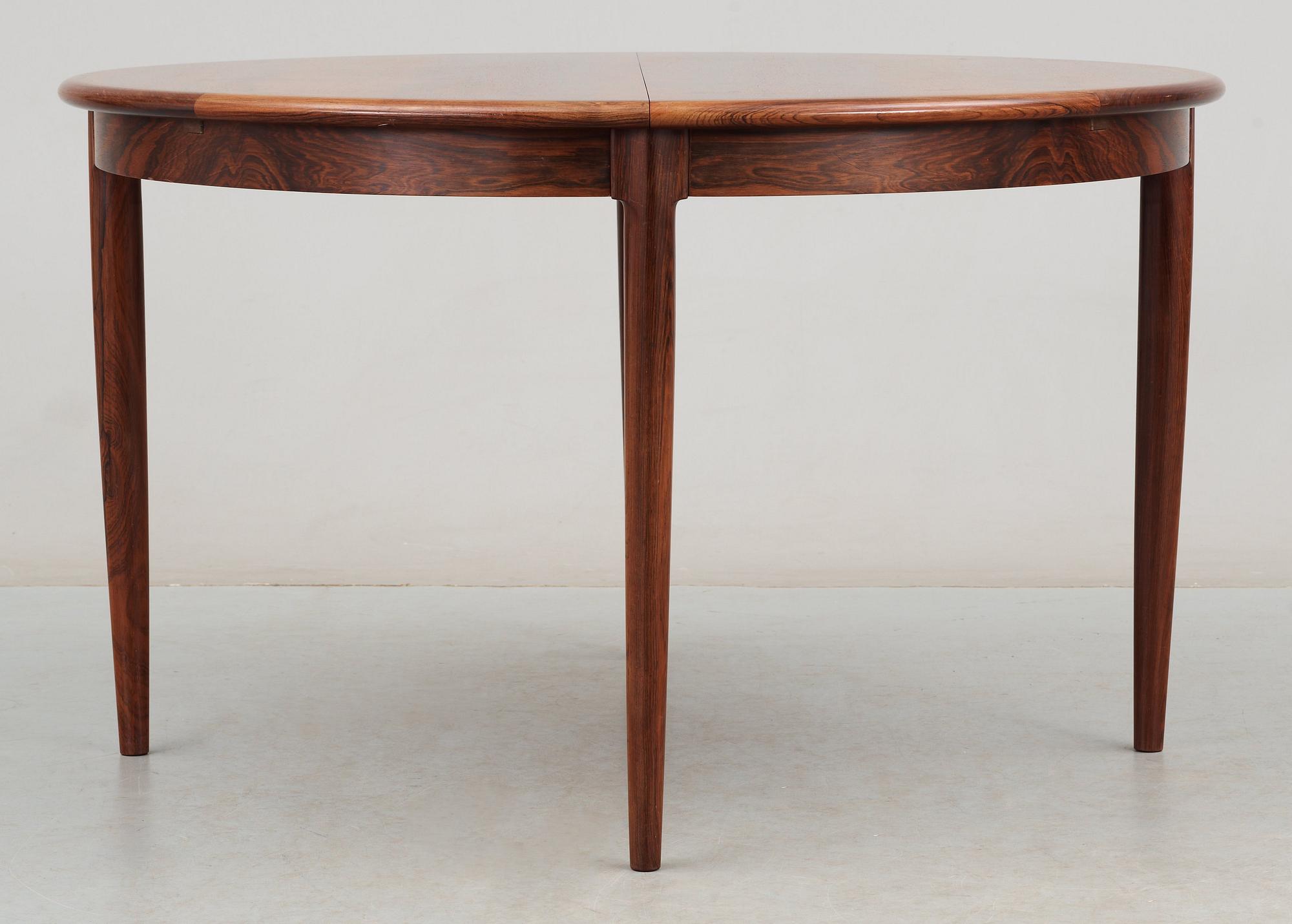 A Niels Ole Møller palisander dining table and nine chairs, J.L. Møller, Denmark 1950's-60's.