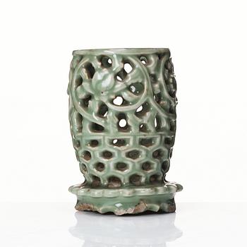 A reticulated lonquan celadon vase/candle holder, Ming dynasty (1368-1644).