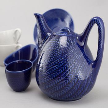 A set of tableware by Hertha Bengtsson called Blå Eld for Gustavsberg during late 20th century.