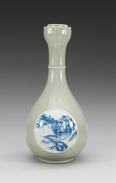 A celadon ground blue and white vase, late Qing dynasty with Qianlongs  mark.