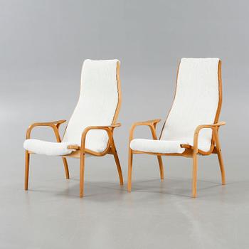 A pair of lounge chairs by Yngve Ekström for Swedese, second half of the 20th century.