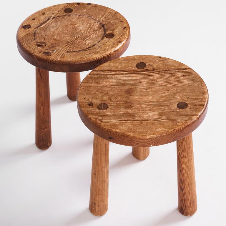 Axel Einar Hjorth, a pair of "Skoga" stained pine stools, Nordiska Kompaniet 1930s.