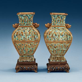 1647. A pair of vases, late Qing dynasty, with Qianlong sealmark.
