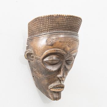 Dance mask "Mwana Pwo" Chokwe Congo 20th century.