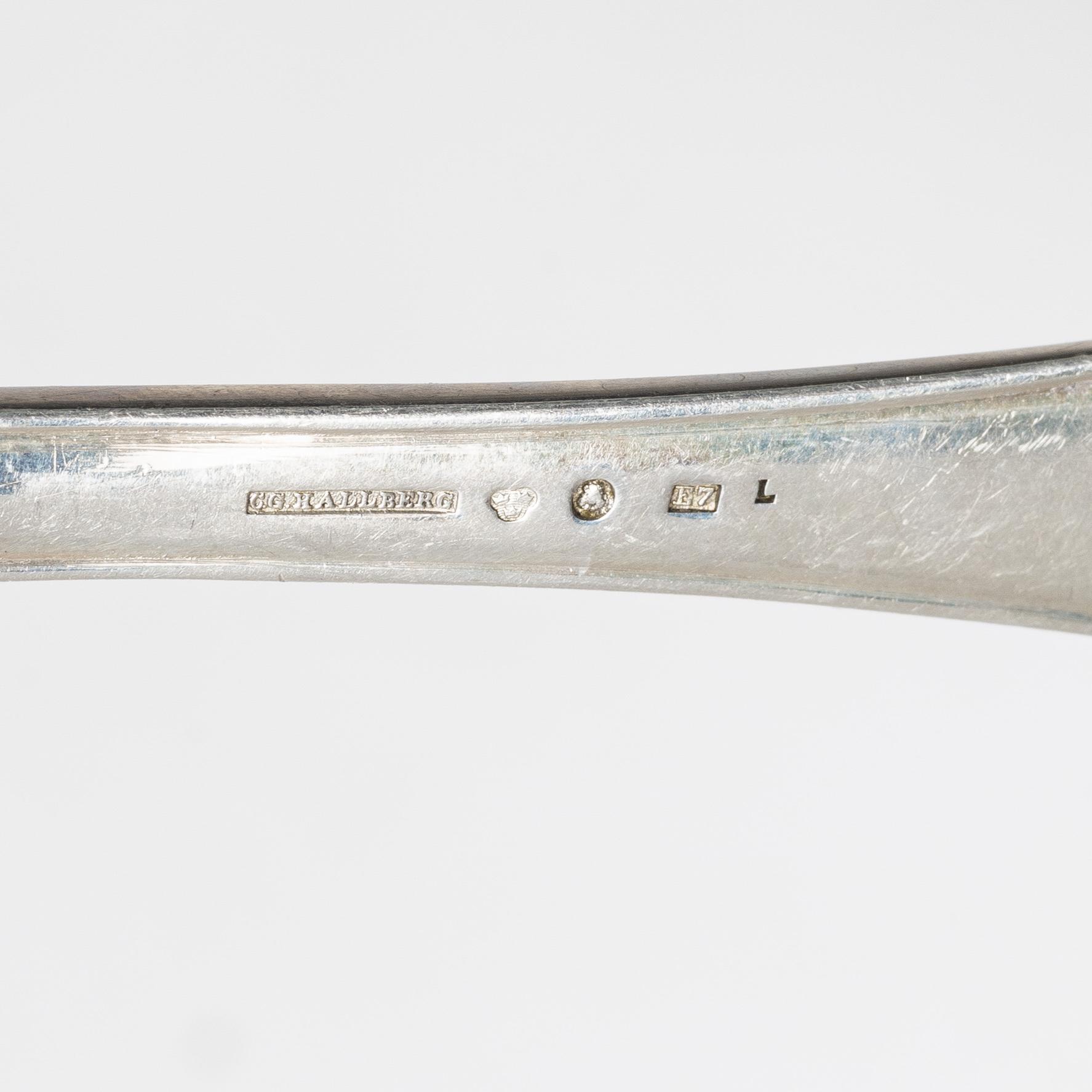 C.G. Hallberg, A 36 piece 'Svensk spets' cutlery service, Stockholm 1907.