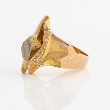Lapponia garnityr med en collier, ett armband, ett par örhängen och en ring, design Björn Weckström.
