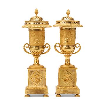 623. A pair of Louis XVI late 18th century gilt bronze perfume-burners.