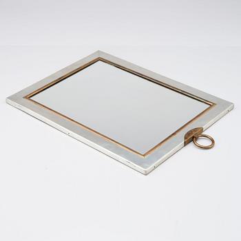 Josef Frank, a pewter and brass wall mirror, Svenskt Tenn, Stockholm 1952.