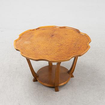 A Swedish Modern root veneer coffee table, Nordiska Kompaniet 1943.