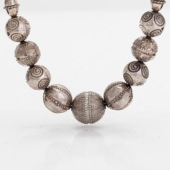 A set of silver "Halikko treasure" necklace, bracelet, ring and earrings. Kalevala Koru, Helsinki 1965-1972.