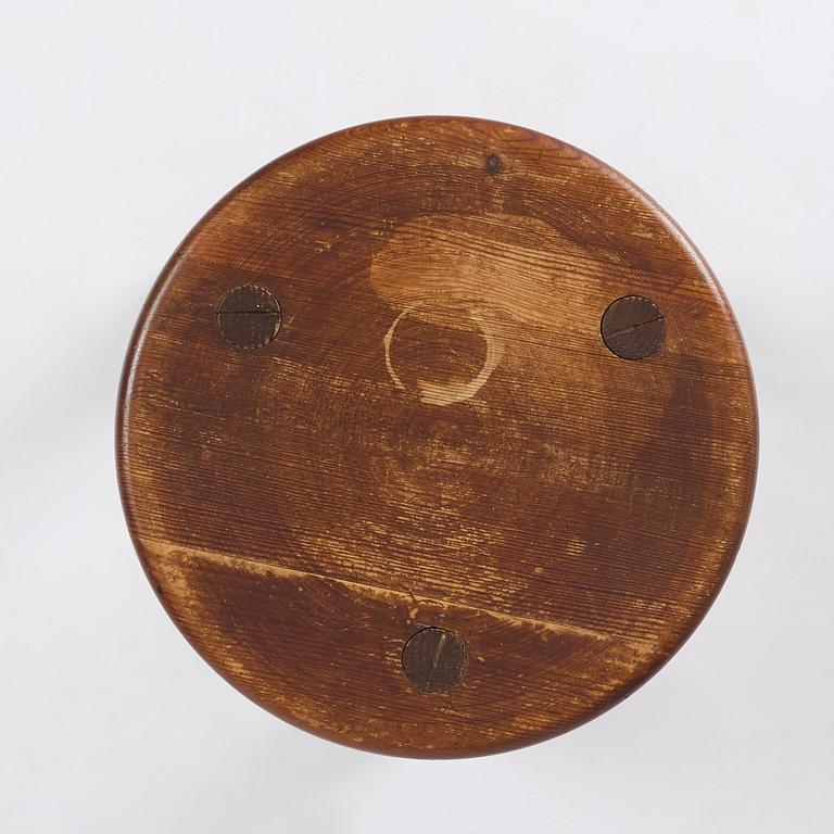Axel Einar Hjorth, a stained pine "Skoga" stool, Nordiska Kompaniet, Sweden, 1930s.