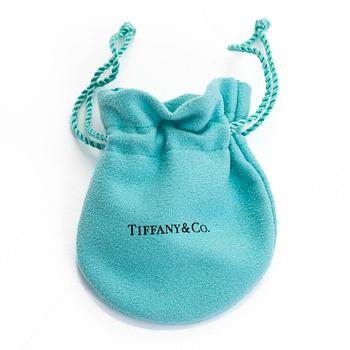 Tiffany & Co, Elsa Peretti, an 18K gold bracelet, 'Diamonds by the Yard', with a diamond approximately 0.08 ct.