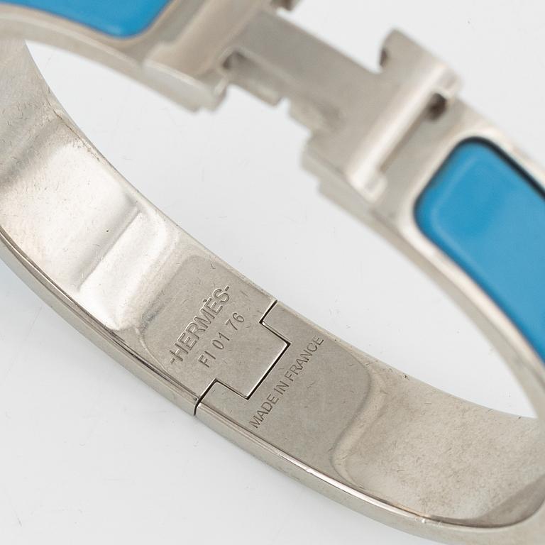 Hermès, a 'Clic H' bracelet.