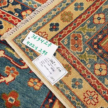 A Kazak carpet, c. 402 x 297 cm.
