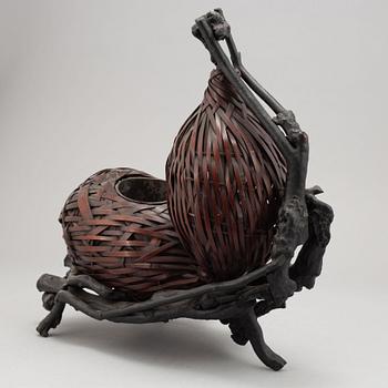 A double gourd shaped Hanakag 'Ikebana' bamboo basket for flower arrangement with stand, first half of the 20th century.