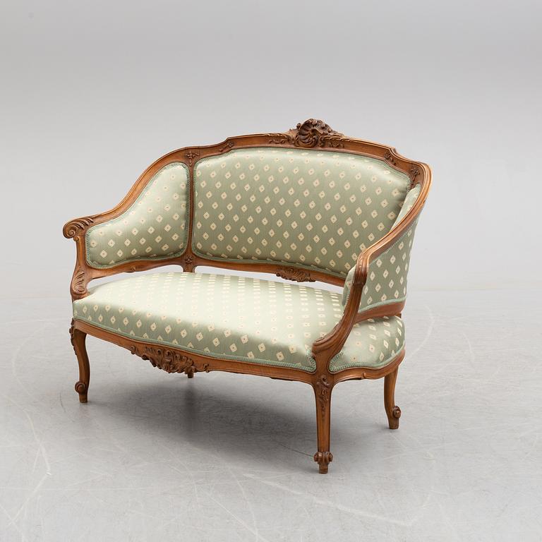 A first half of the 20th century rococo style sofa.