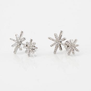 Efva Attling, a pair of "Beam & Stars Two Ear" earrings in rhodium-plated sterling silver with round brilliant-cut diamonds.