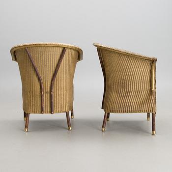 A PAIR OF ARM CHAIRS, Lloyd Loom, Spalding England, for Mulberry's Home, turn of the 21st century.