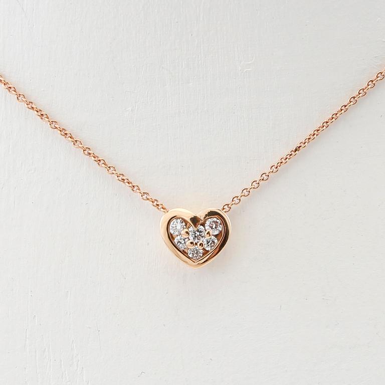 Necklace 18K rose gold with round brilliant cut diamonds.