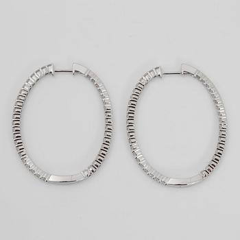 A pair of brilliant-cut diamond earrings. Total carat weight circa 2.30 cts.