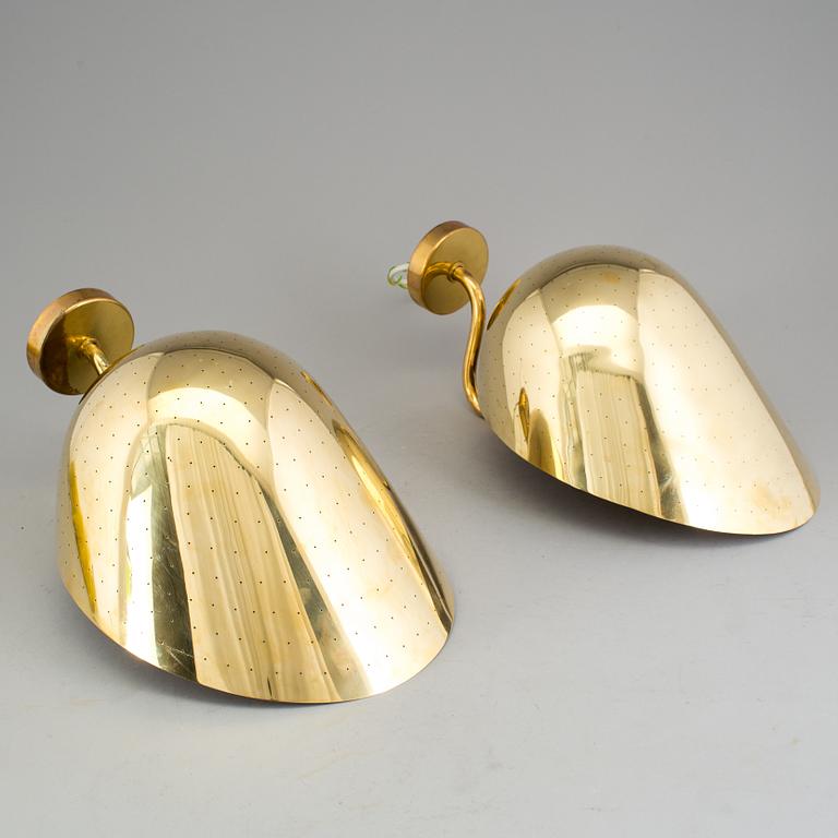 CARL-AXEL ACKING, a pair of brass wall lights.