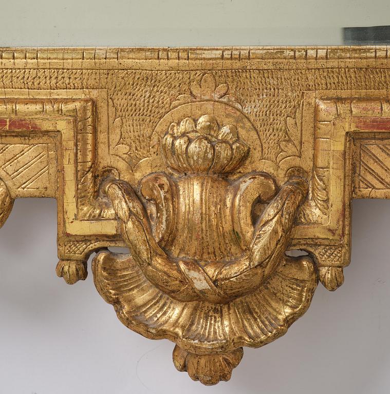 A Trasitional giltwood mirror by J. Åkerblad (master in Stockholm 1758-99).