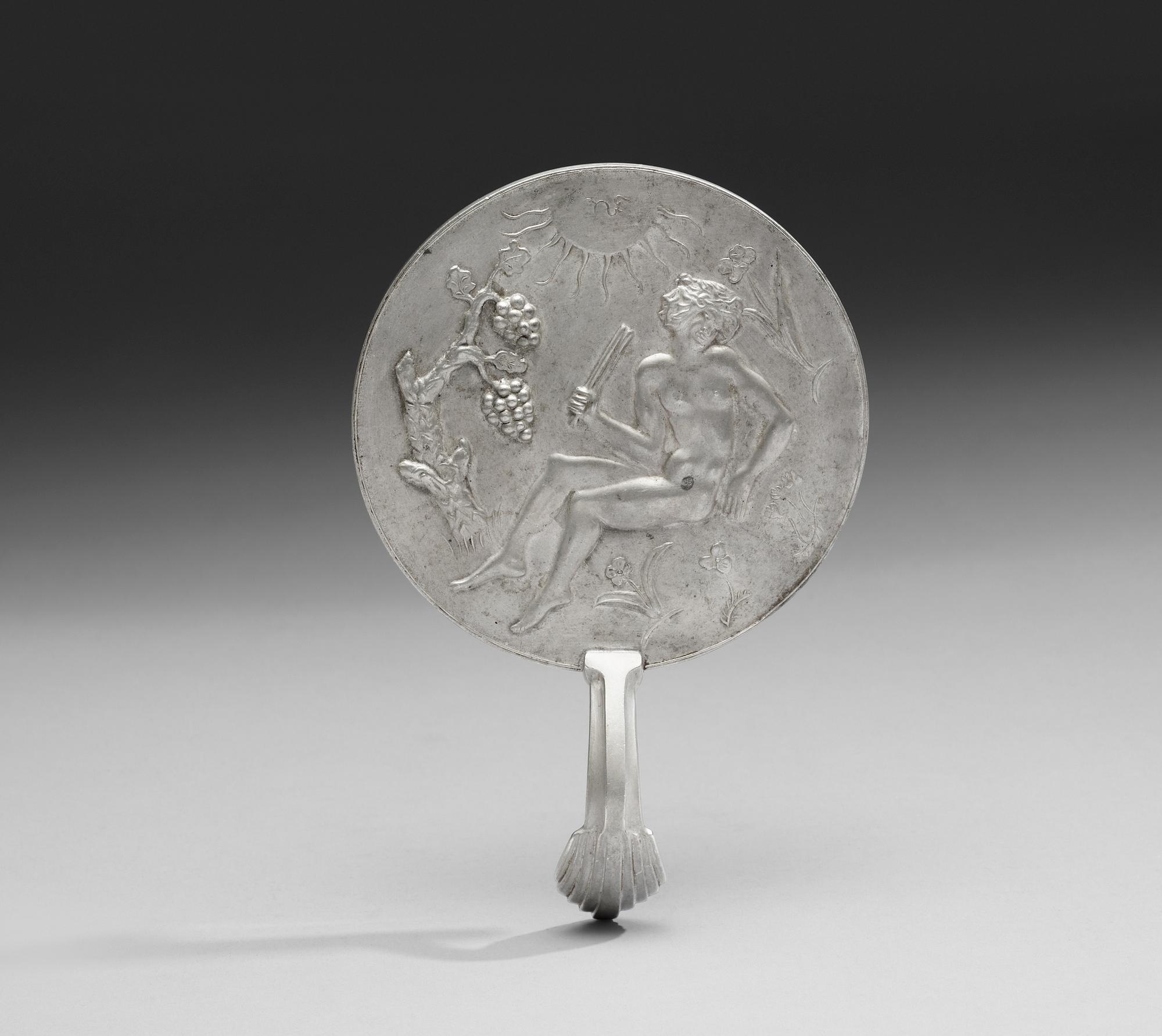 A Nils Fougstedt, pewter mirror by Svenskt Tenn, 1920's-1930's, model 508.