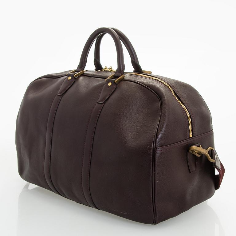Louis Vuitton, a 'Taiga Kendall PM' weekend bag.