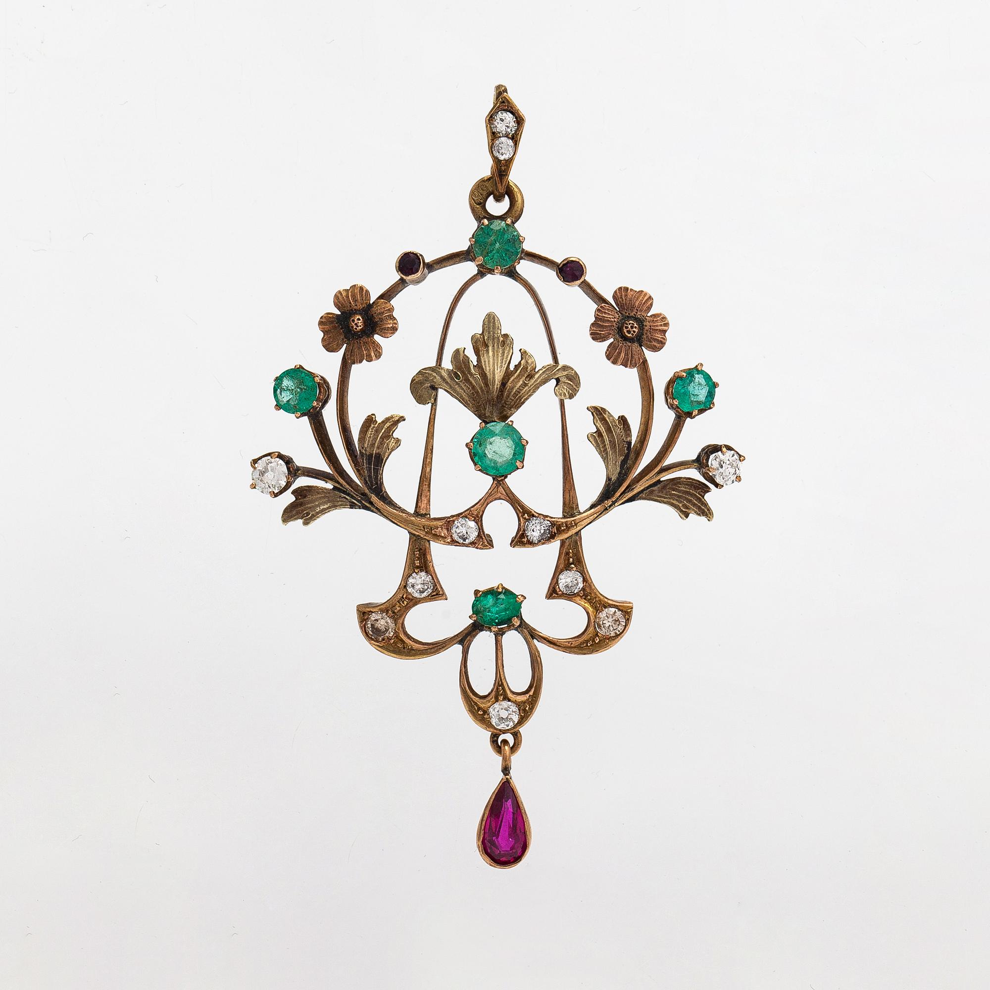 A 14K gold pendant with emeralds, rubies and diamonds ca. 0.45 ct in total. Russia early 20th century.