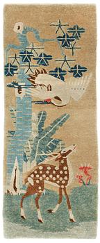 1690. A semi-antique Chinese figural rug.