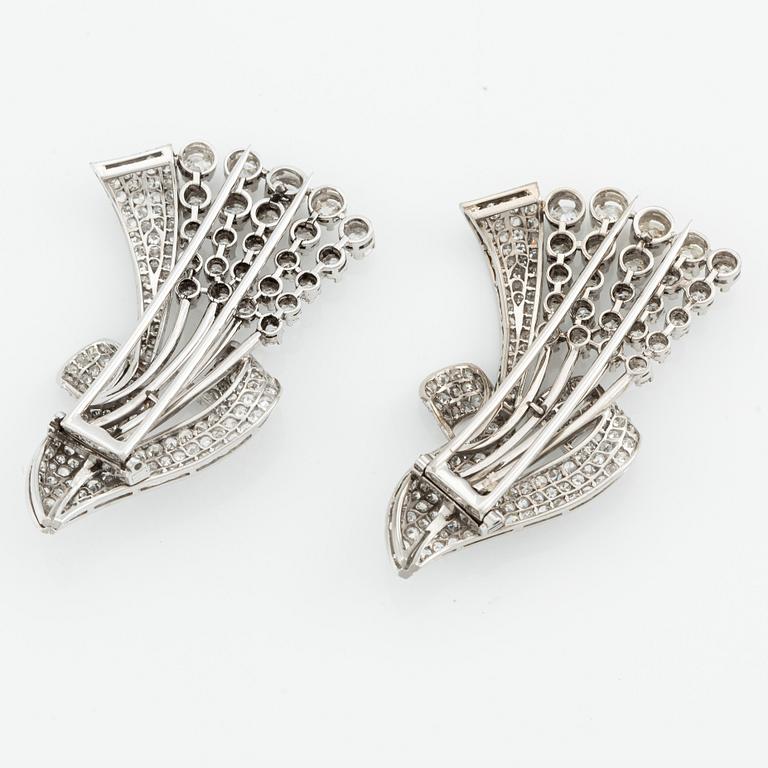 A pair of platinum brooches with old-cut, round brilliant-cut and single-cut diamonds.