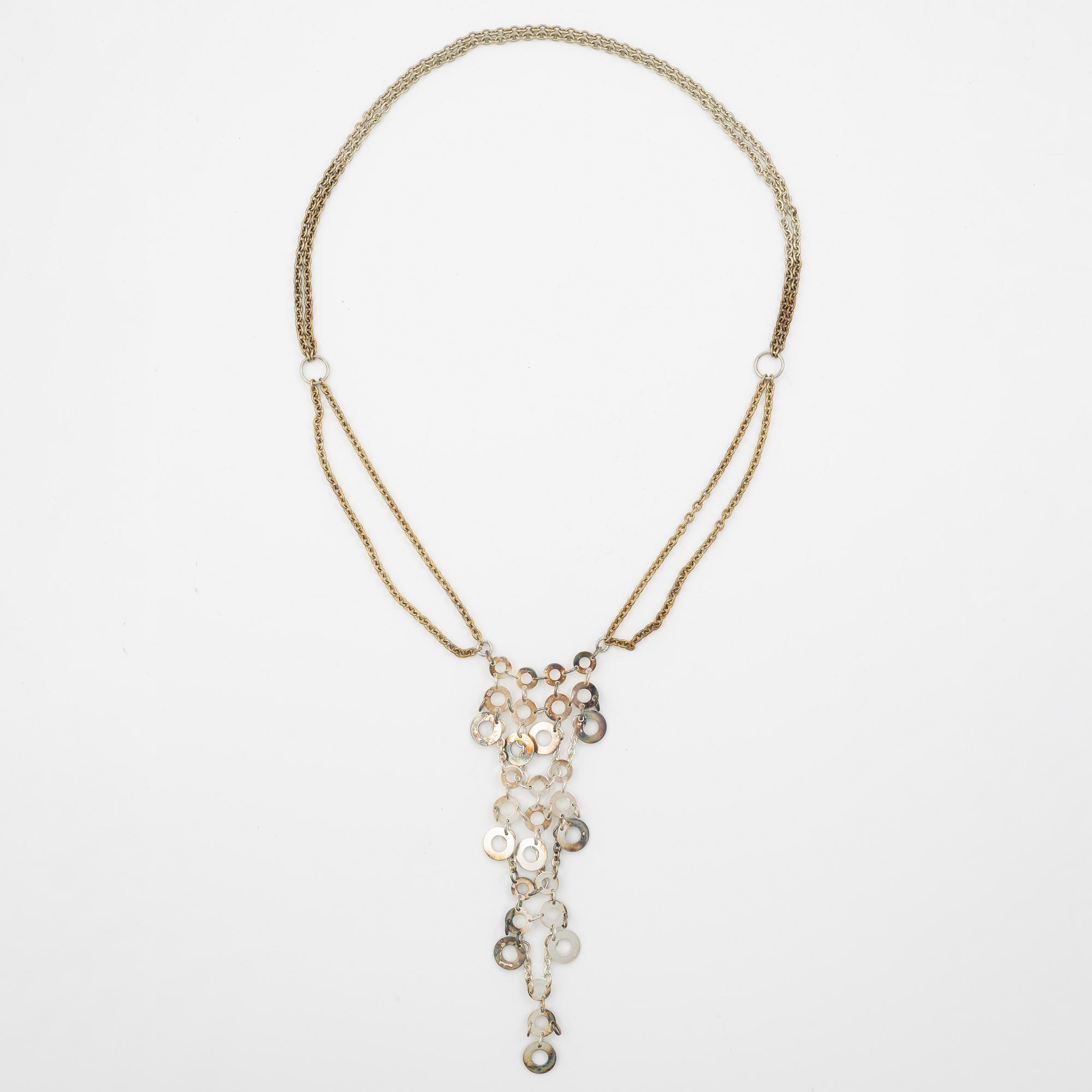Siv Lagerström två collier vit metall.