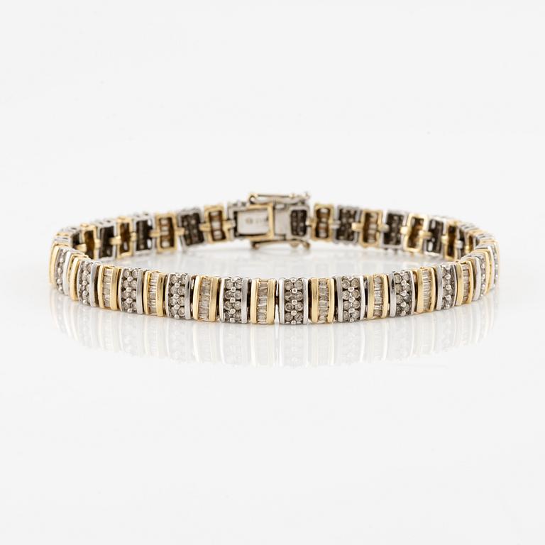 Bracelet, 14K gold with brilliant- and baguette-cut diamonds.