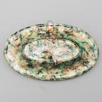 A richly decorated Palissy-style majolica plate, 19th century.