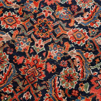 A Farahan rug, semi-antique/antique, 390 x 197 cm.