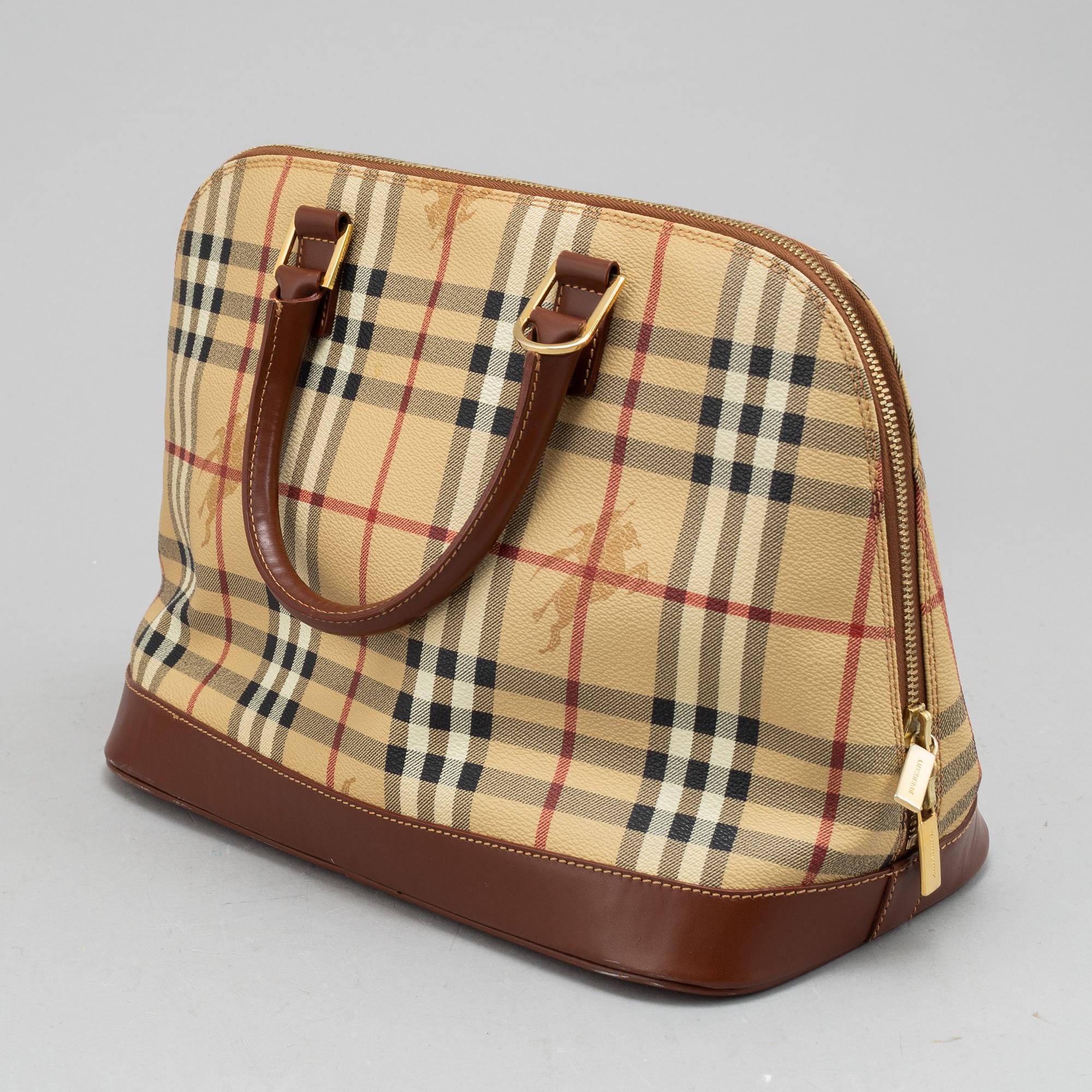 Burberry, a handbag and wallet.