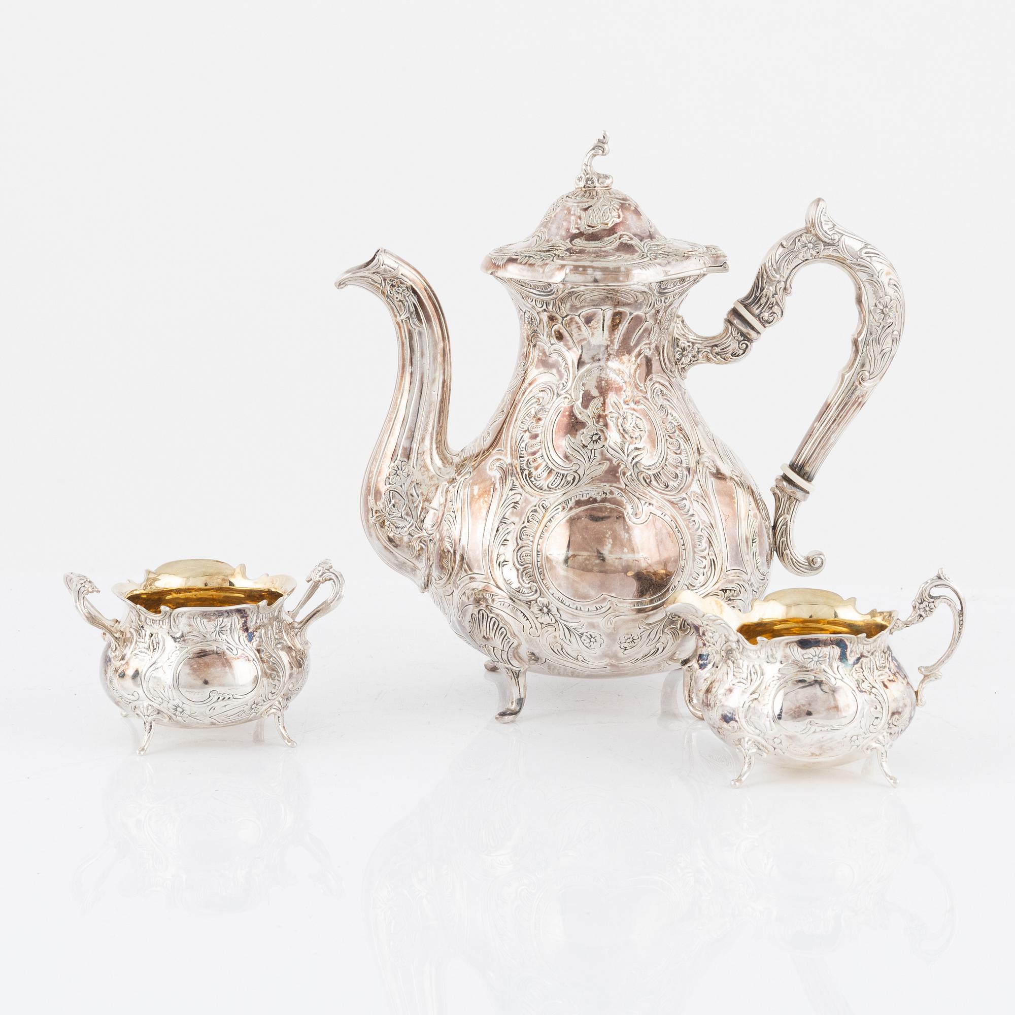 A Swedish Silver Coffee Pot, Creamer and Sugar Bowl, mark of Gewe Silvervarufabriken, Malmö 1971-73.