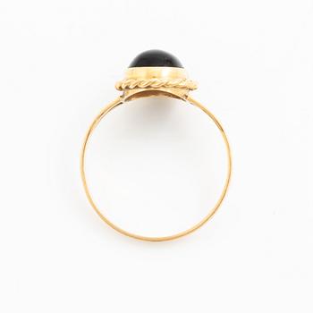 Ring 18K guld med svart sten.