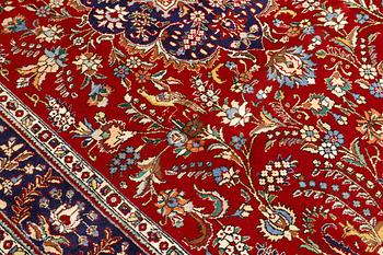 A carpet, Figural Tabriz, ca 310 x 220 cm.