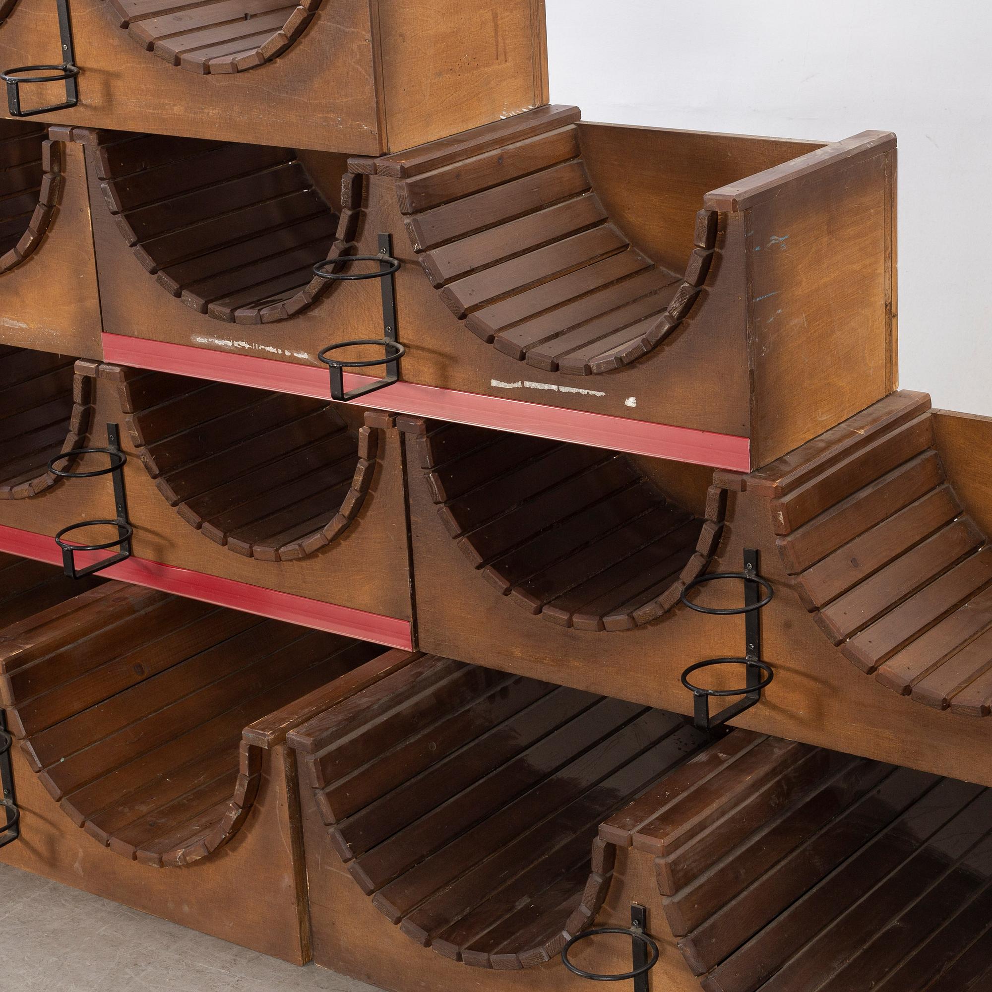A set of nine loose wood wine racks from the turn of the century 1900/2000.