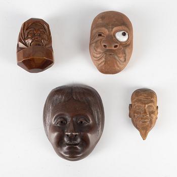 A group of four Japanese figures / netsuke, 19th/20th century.