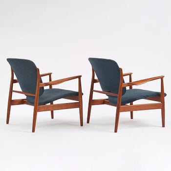 Finn Juhl, a pair of "FD 136" easy chairs, France & Daverkosen, Denmark, 1950s.