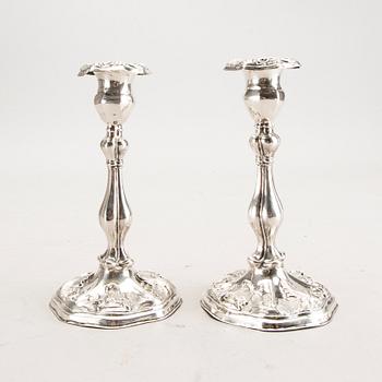 A 19th century pair of silver candle sticks mark of Oskar Närman Mariestad 1877.