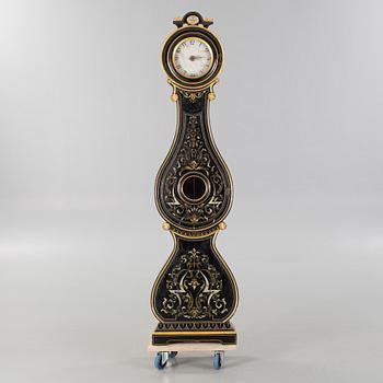 A grandfather clock, 19th century.