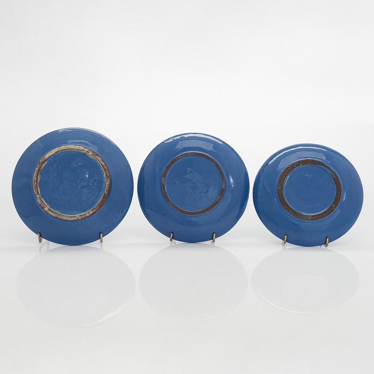 Marita Lybeck, a set of three ceramic plates and cream jug, red clay, signed ML.