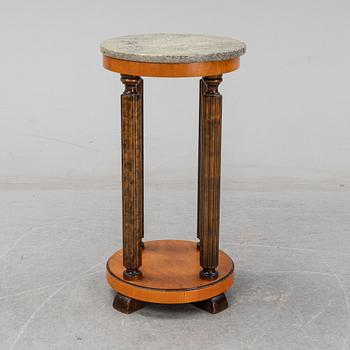 A stone top pedestal, 1920's/30's.