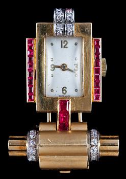 1142. A ruby and diamond watch, 1940's.