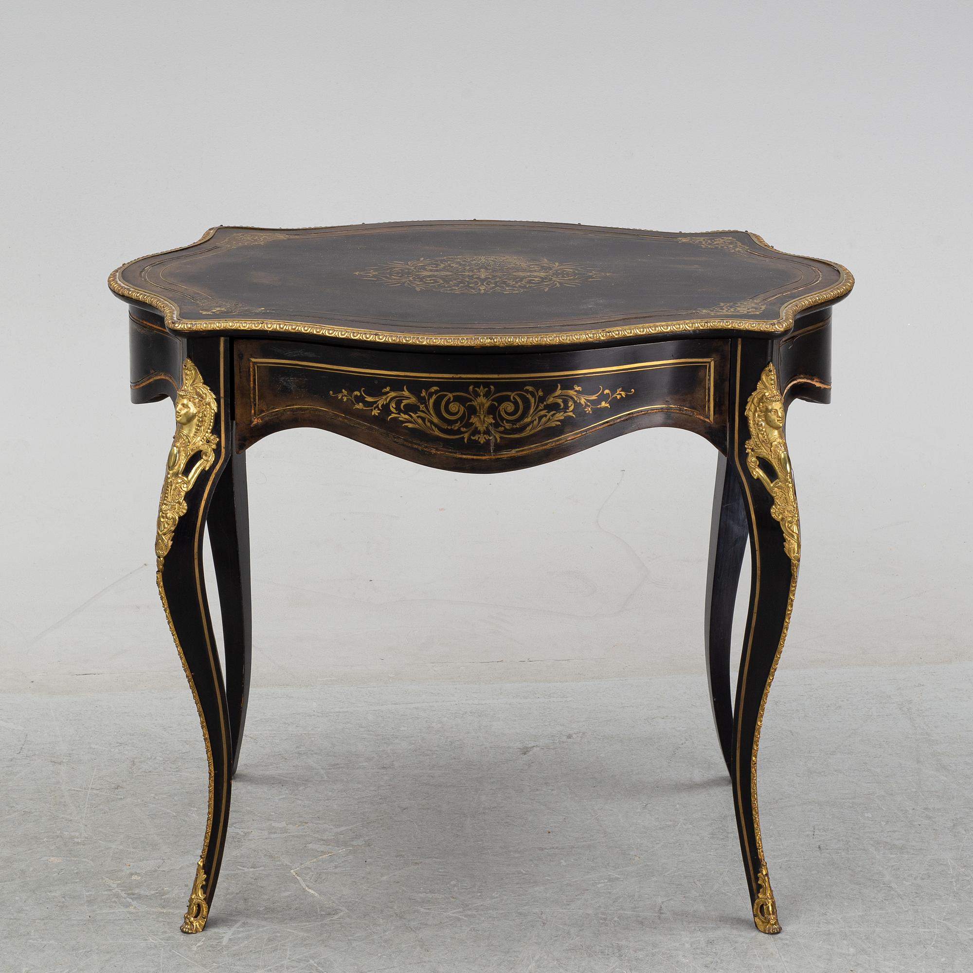 A Louis XV style table, early 20th Century.