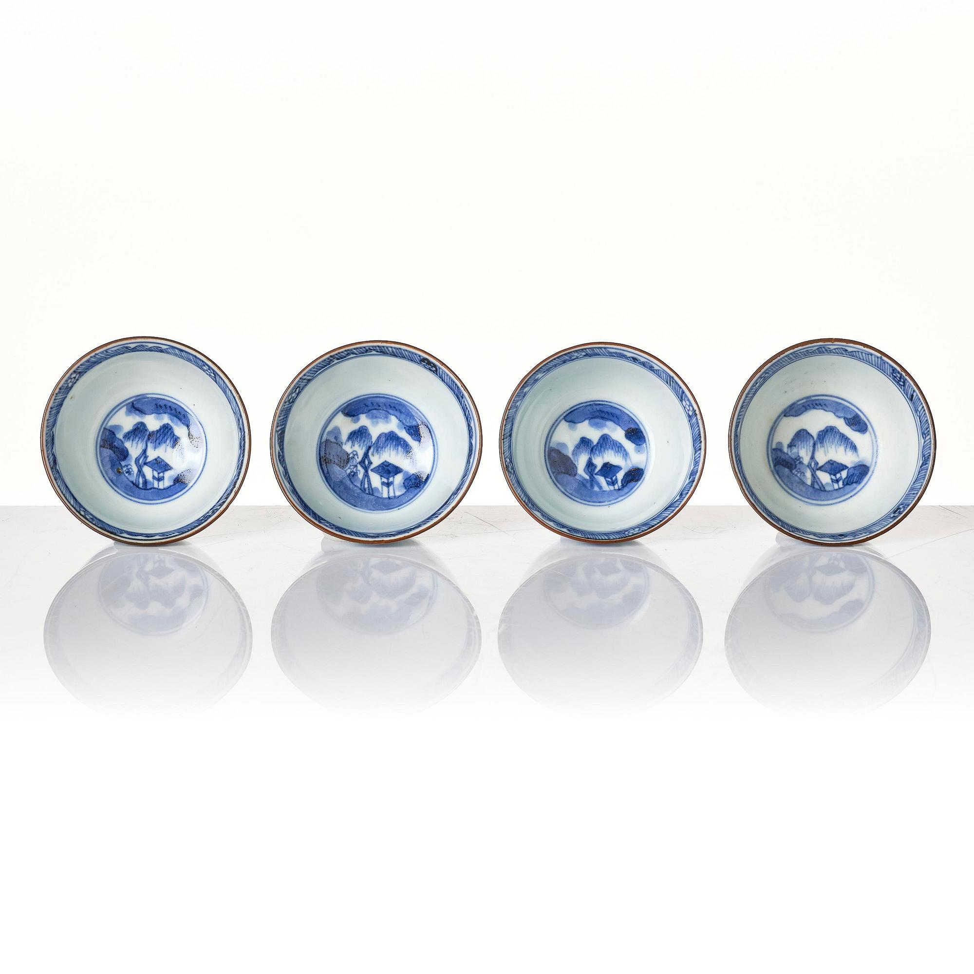 A matched set of eight blue and white cups and stands, Qing dynasty, Kangxi (1662-1722).