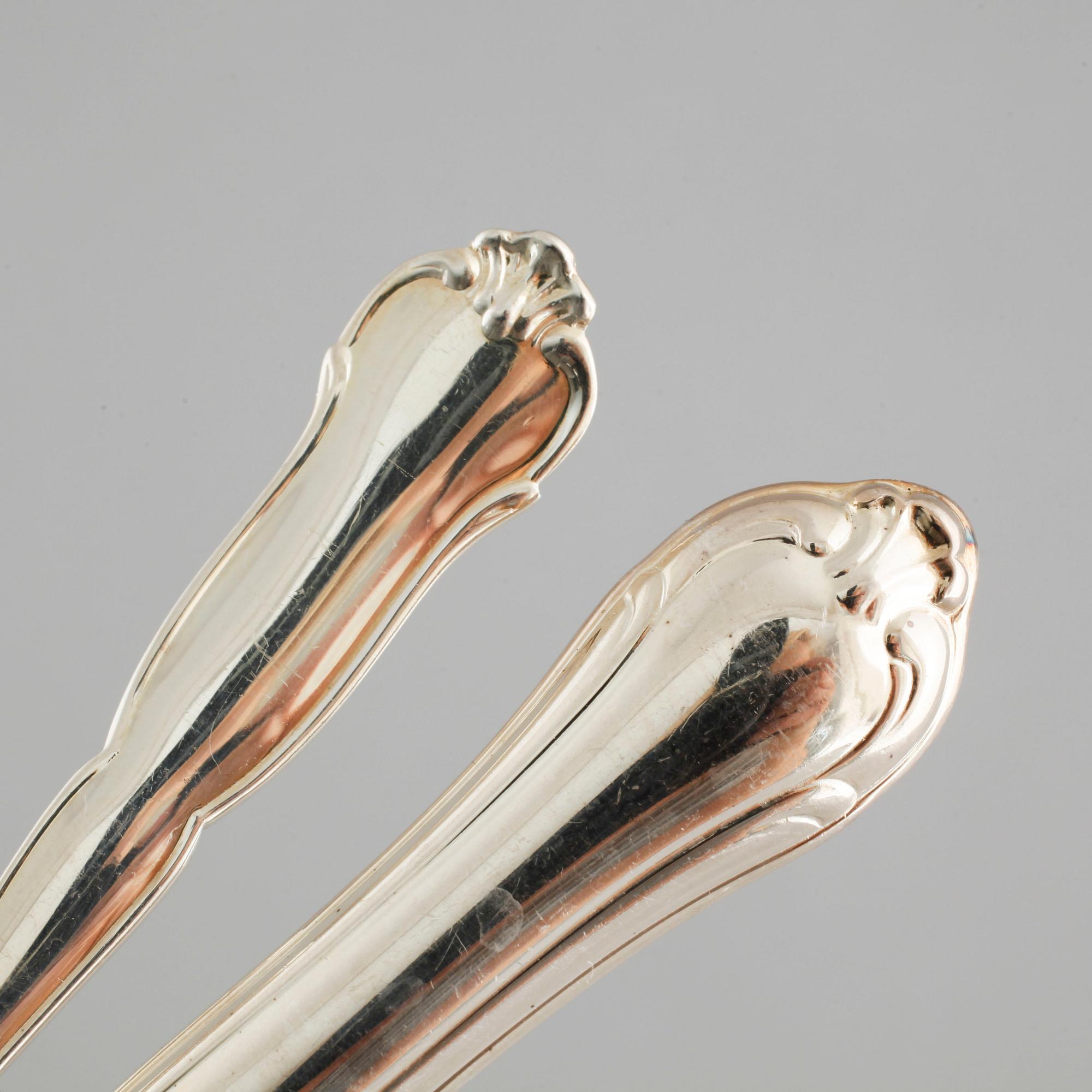 72 silver cutlery by C.G Hallberg, Stockholm, 20th century.